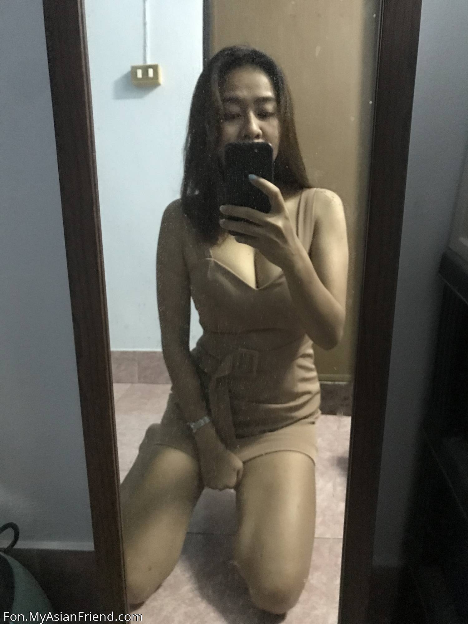 Beautiful Thai girl named Fon gets ready for work